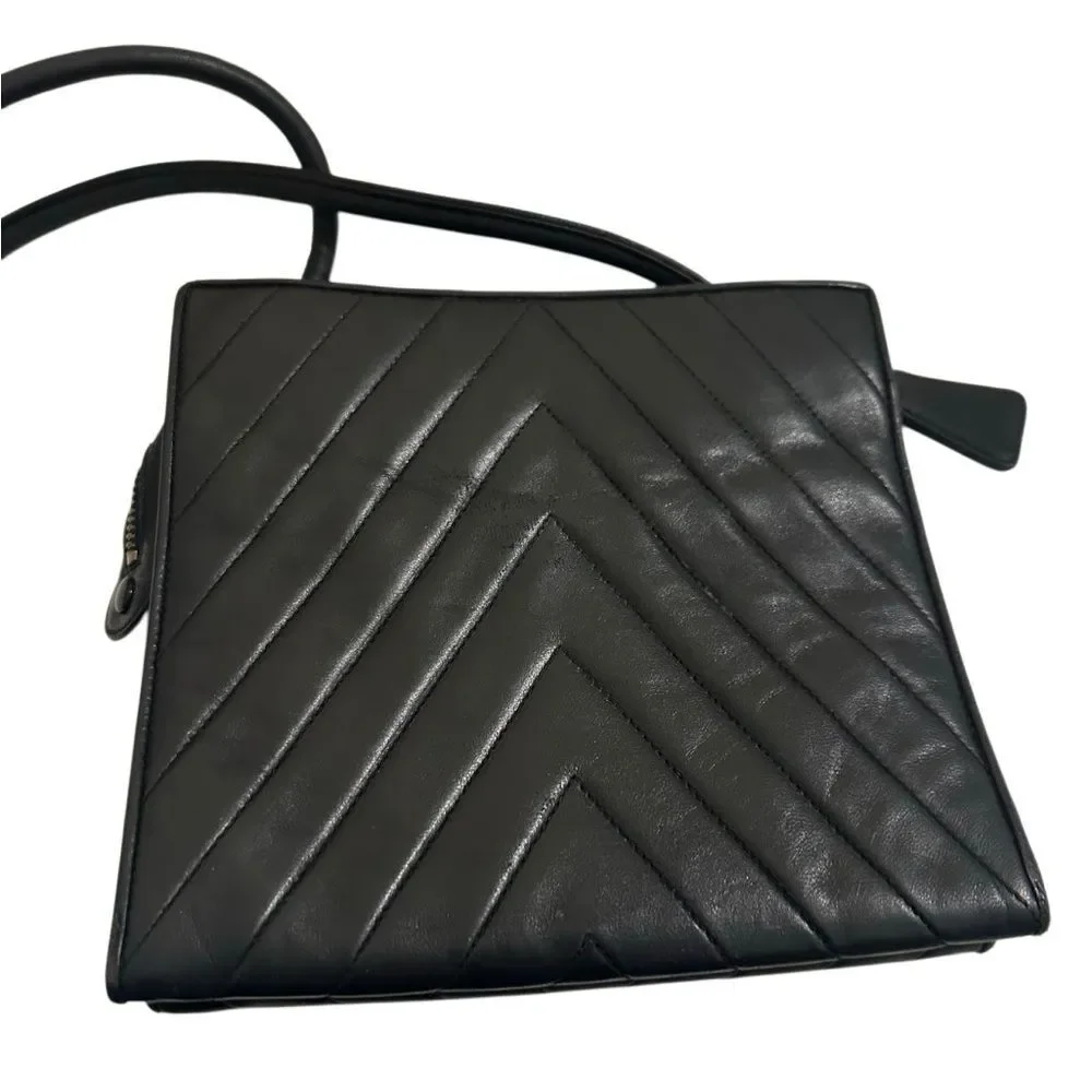 CHANEL Black Chevron Leather Shoulder Bag with Gold Accent